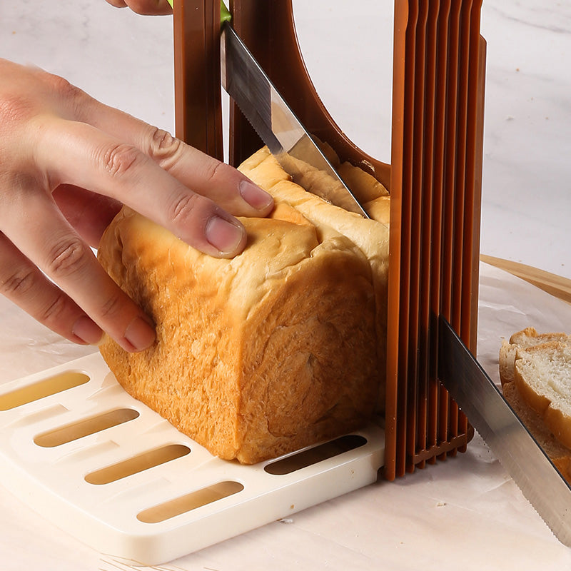 Manual bread and toast slicing tool