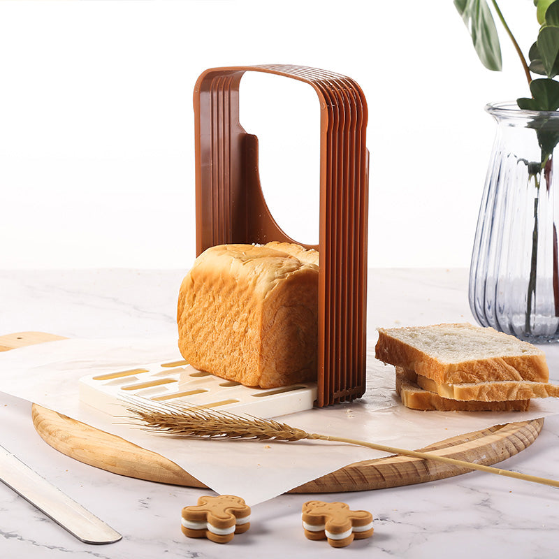 Manual bread and toast slicing tool